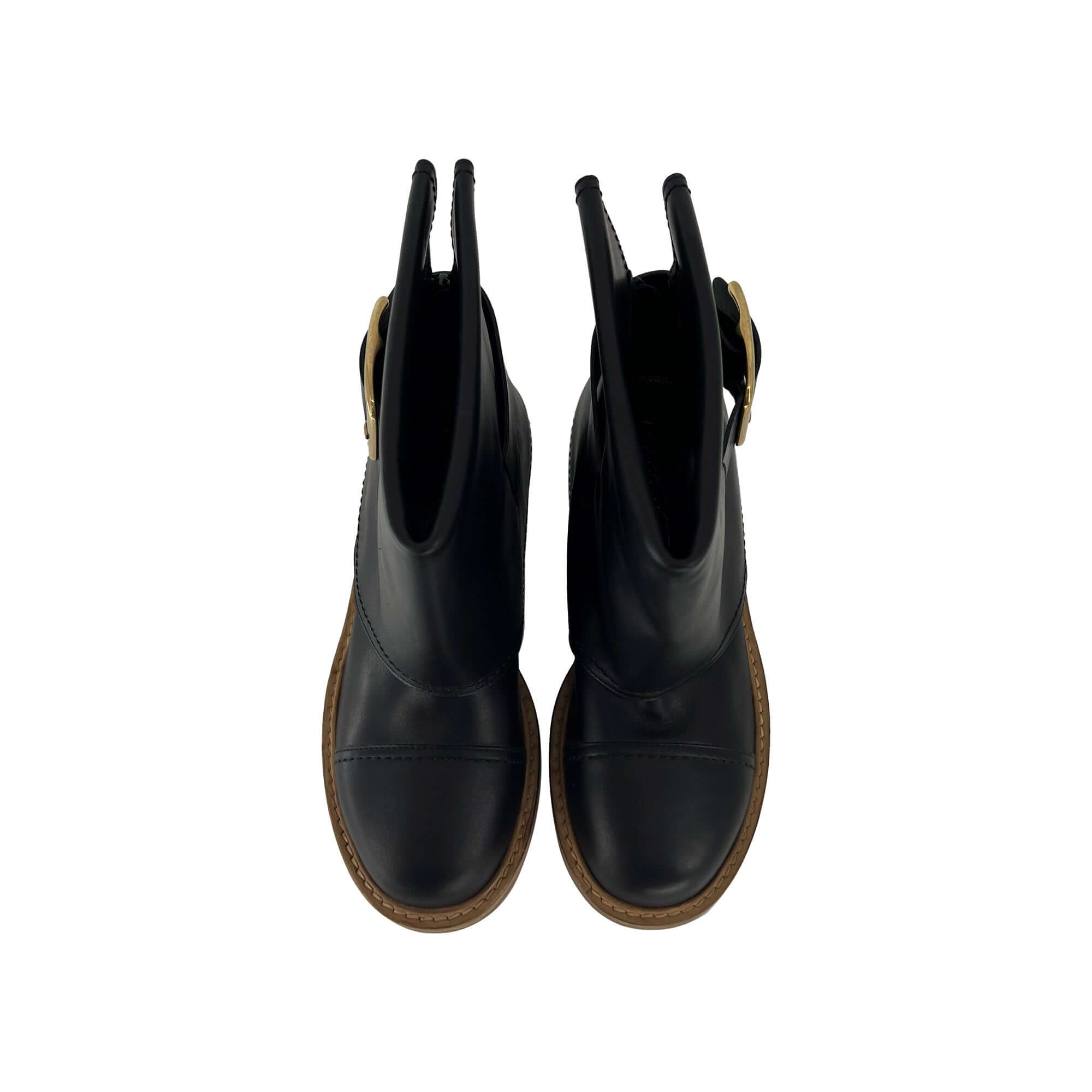 Alexander McQueen gold buckled leather ankle boots