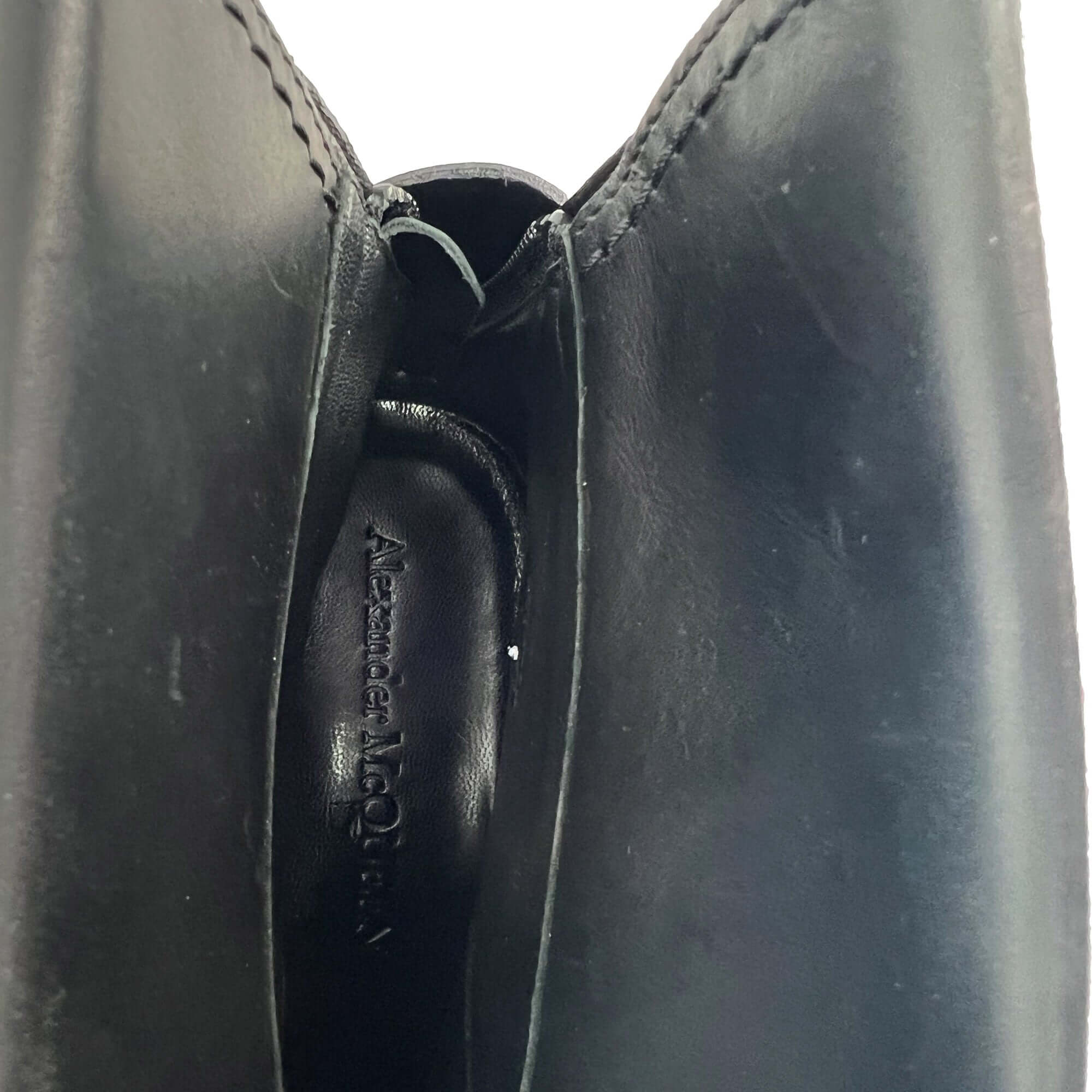 Alexander McQueen gold buckled leather ankle boots