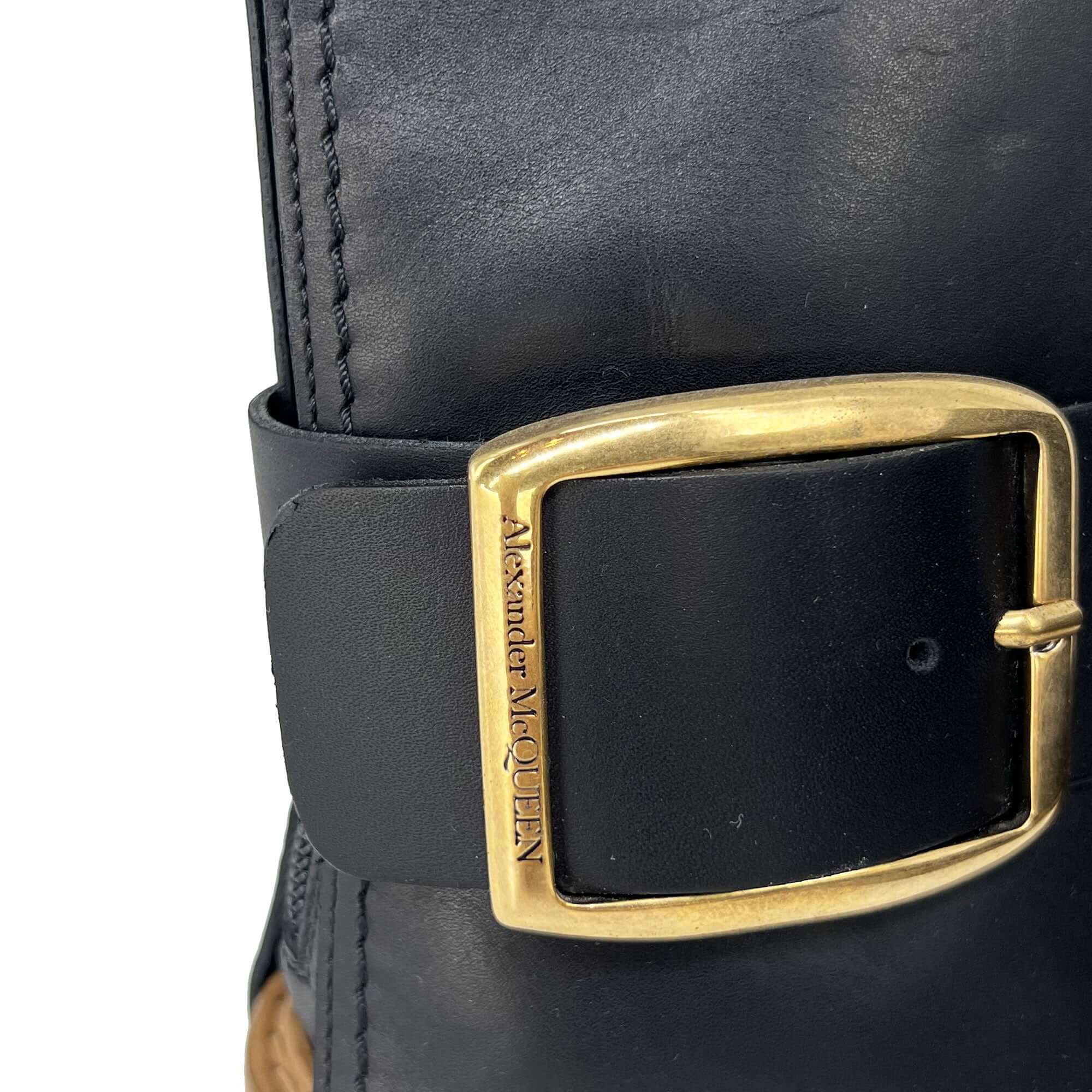 Alexander McQueen gold buckled leather ankle boots