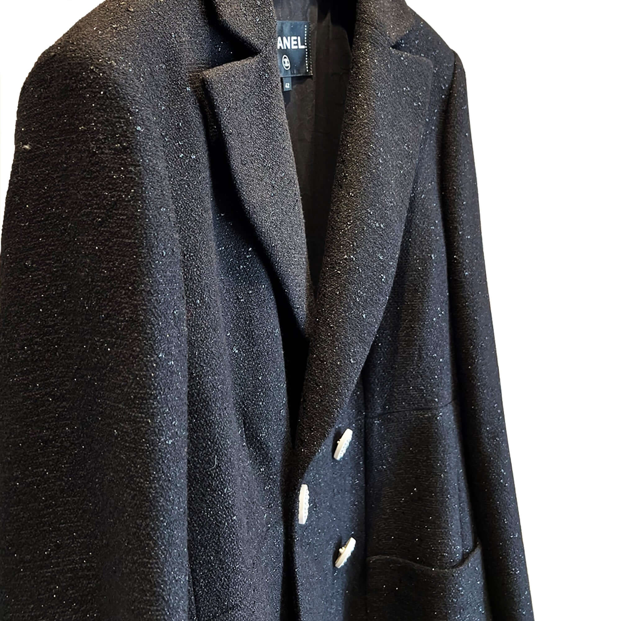 Chanel black jacket with white buttons