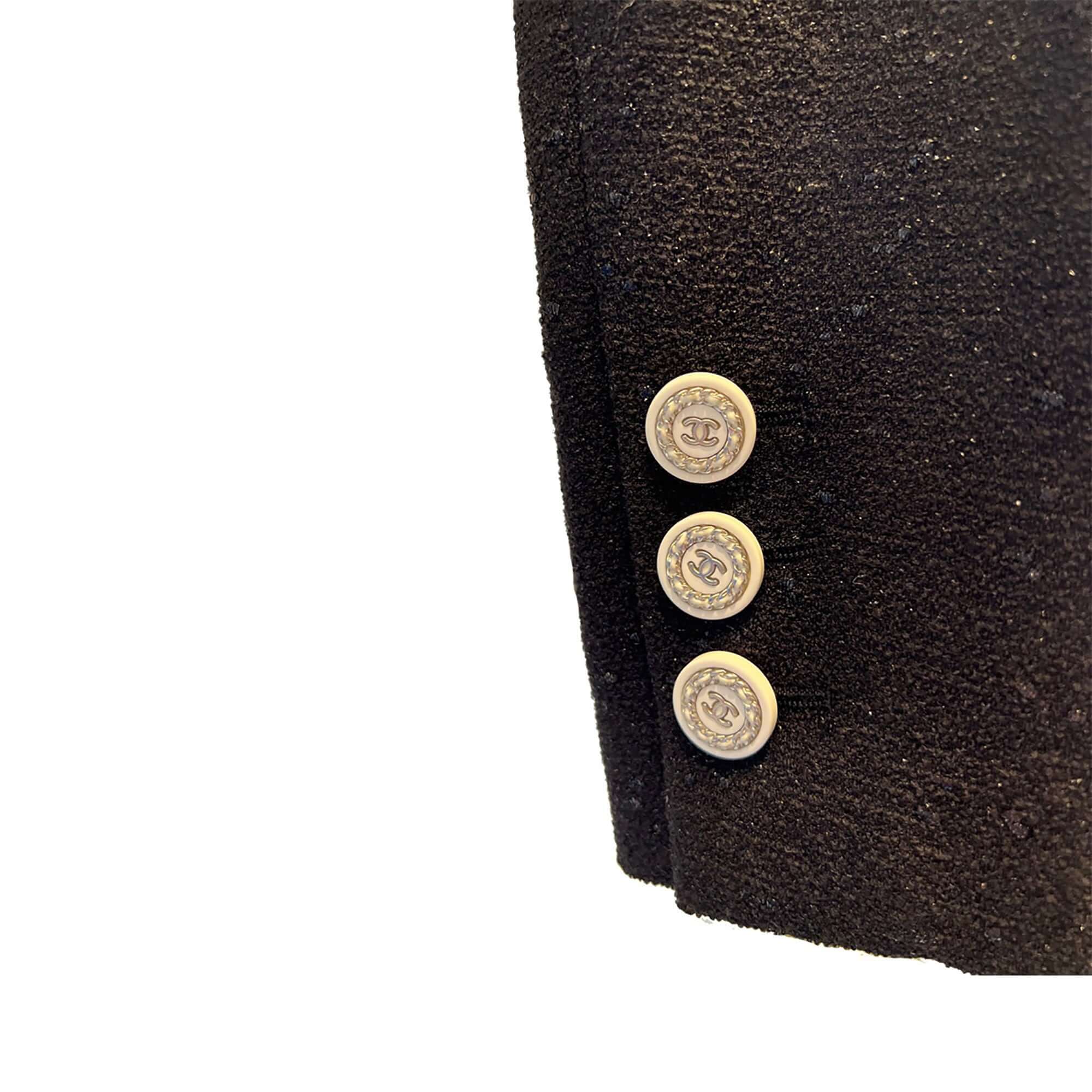Chanel black jacket with white buttons