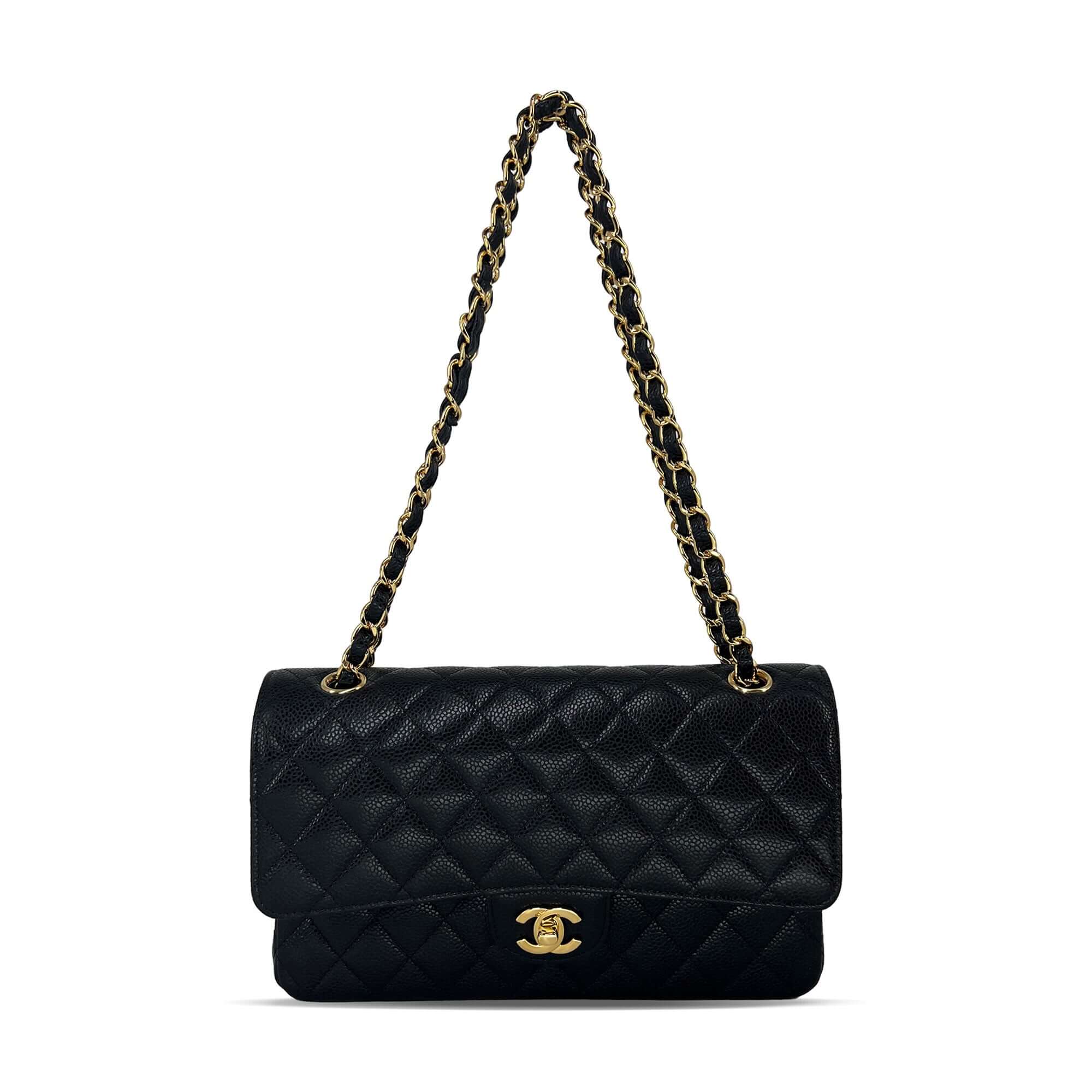 Chanel medium black caviar leather double flap closure bag