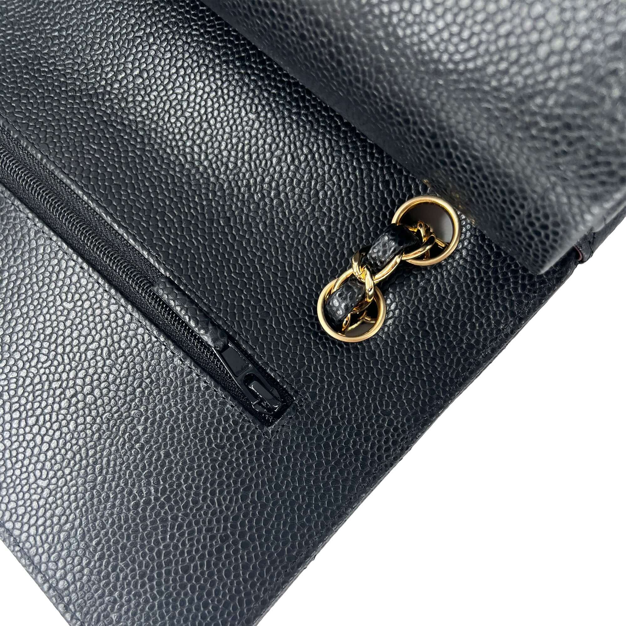 Chanel medium black caviar leather double flap closure bag
