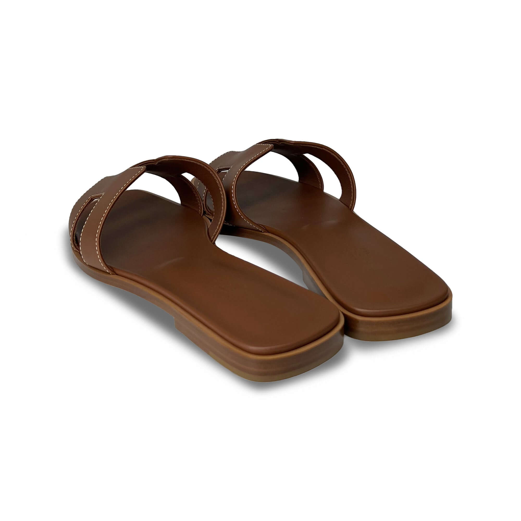 Hermes Oran Designer Leather Slippers in Brown back angle