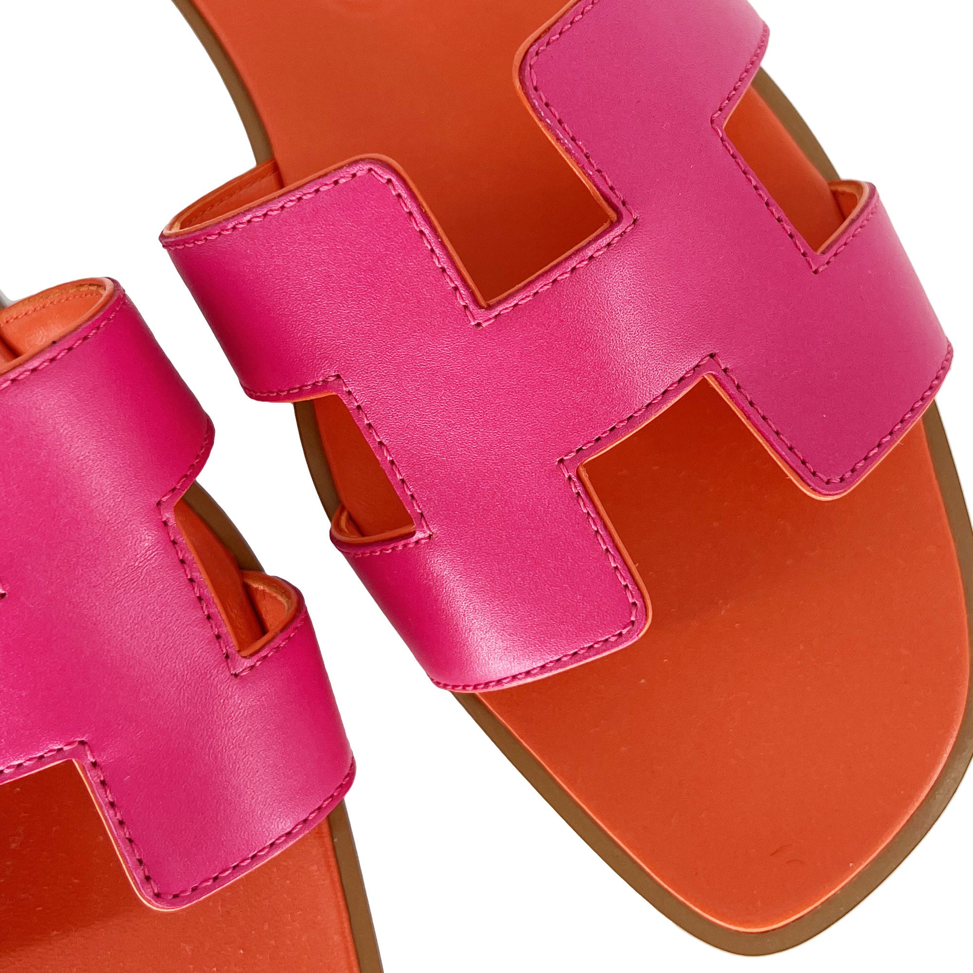 Hermes Oran Designer Slippers in Rose/Orange detail