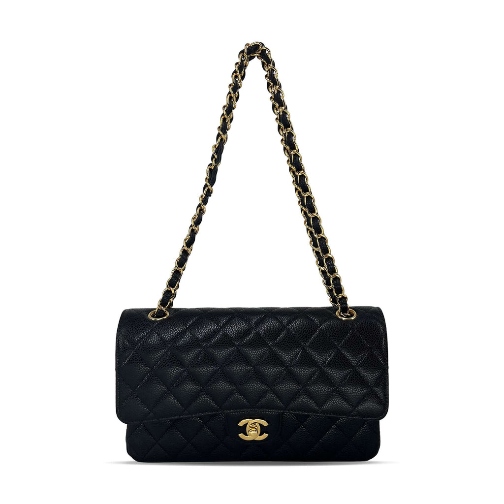 Pre owned Chanel medium black caviar leather flap designer bag