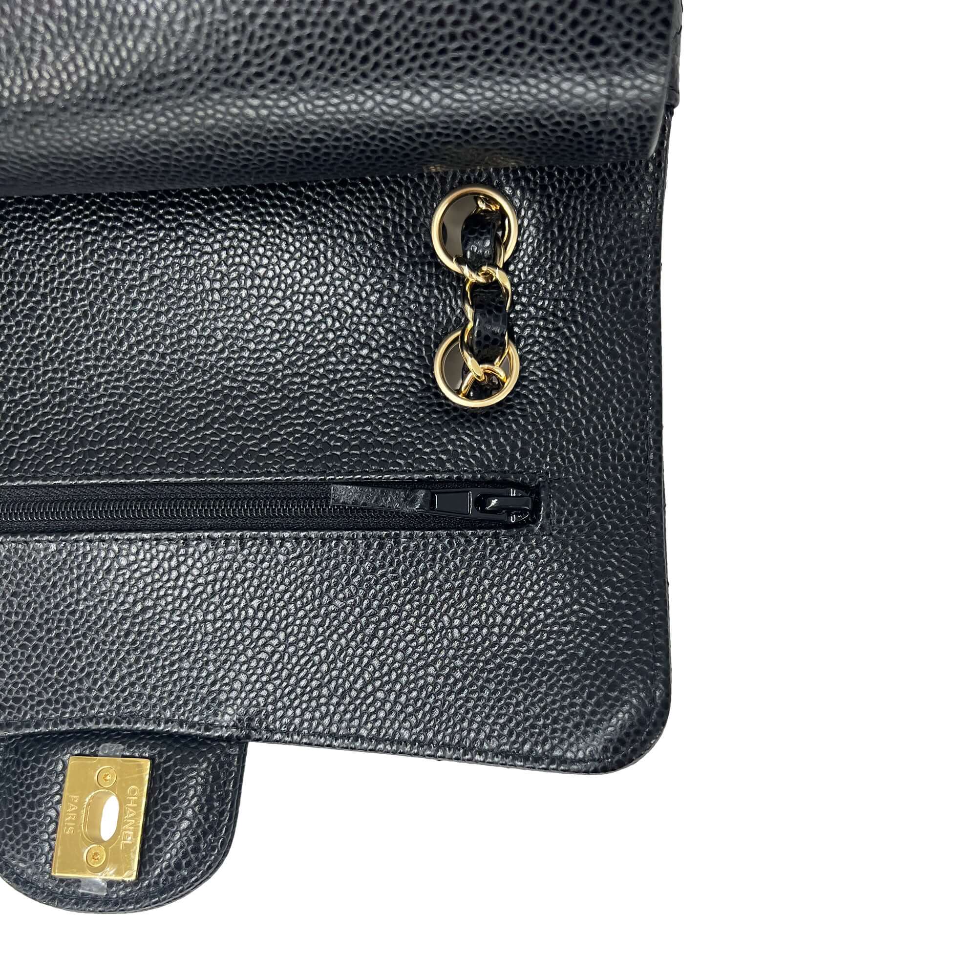 Chanel small black caviar leather double flap closure bag